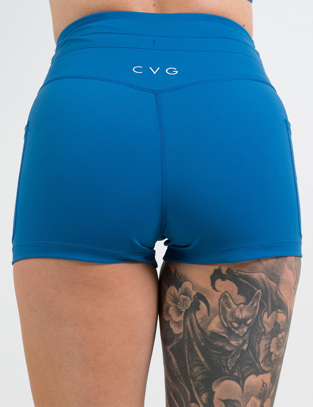 back of the 2.5 inch blue omni style shorts against a white background