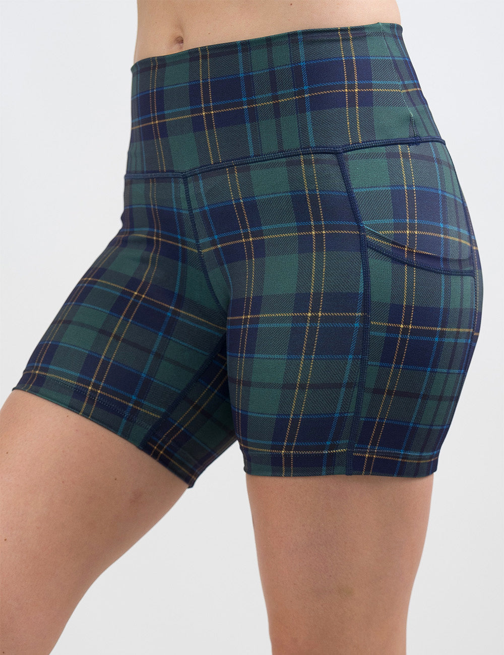front of the 5 inch blue, green, and yellow plaid shorts against a white background