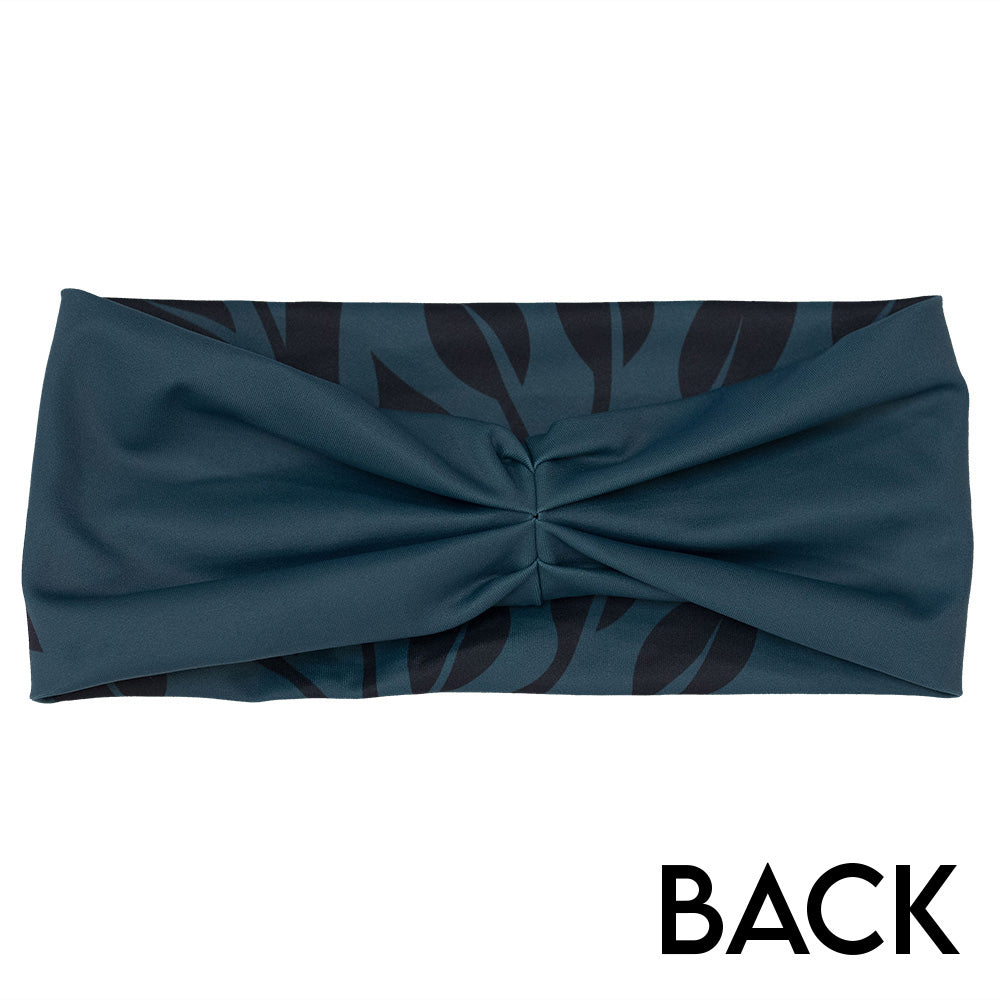 back of the Teal headband with black leaf pattern on a white background