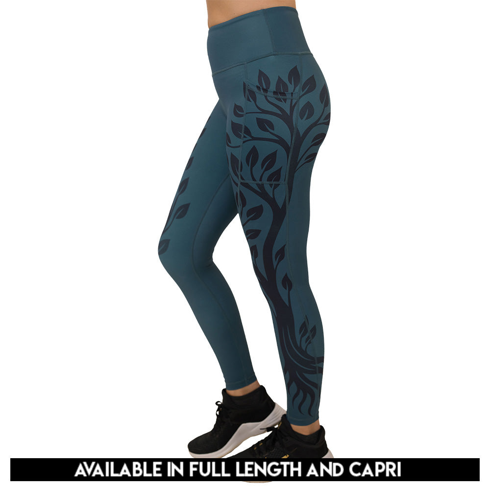 Teal leggings with black leaf pattern available in full and capri length 