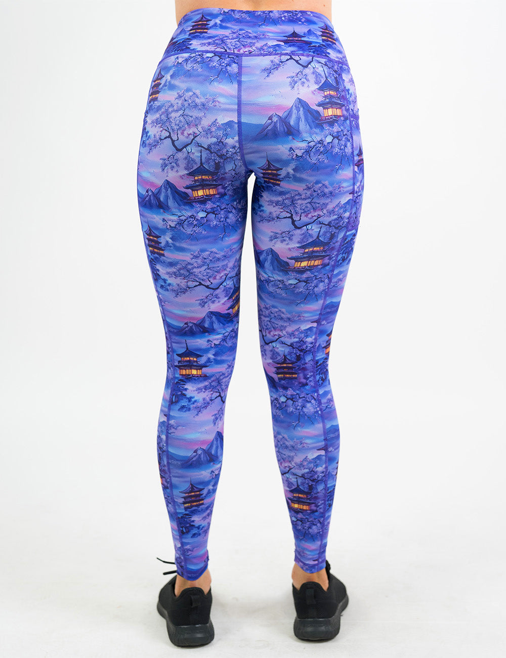 back of the full length lavender and blue floral full length leggings featuring traditional pagodas and blooming cherry trees 