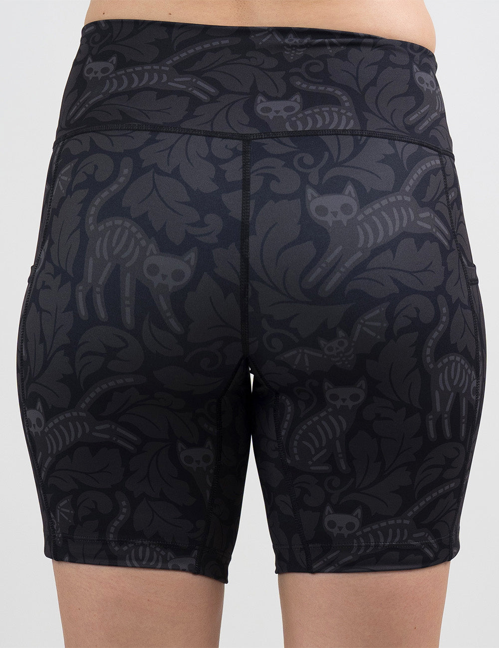 back of the 7 inch black and grey bats and cats skeleton shorts against a white background