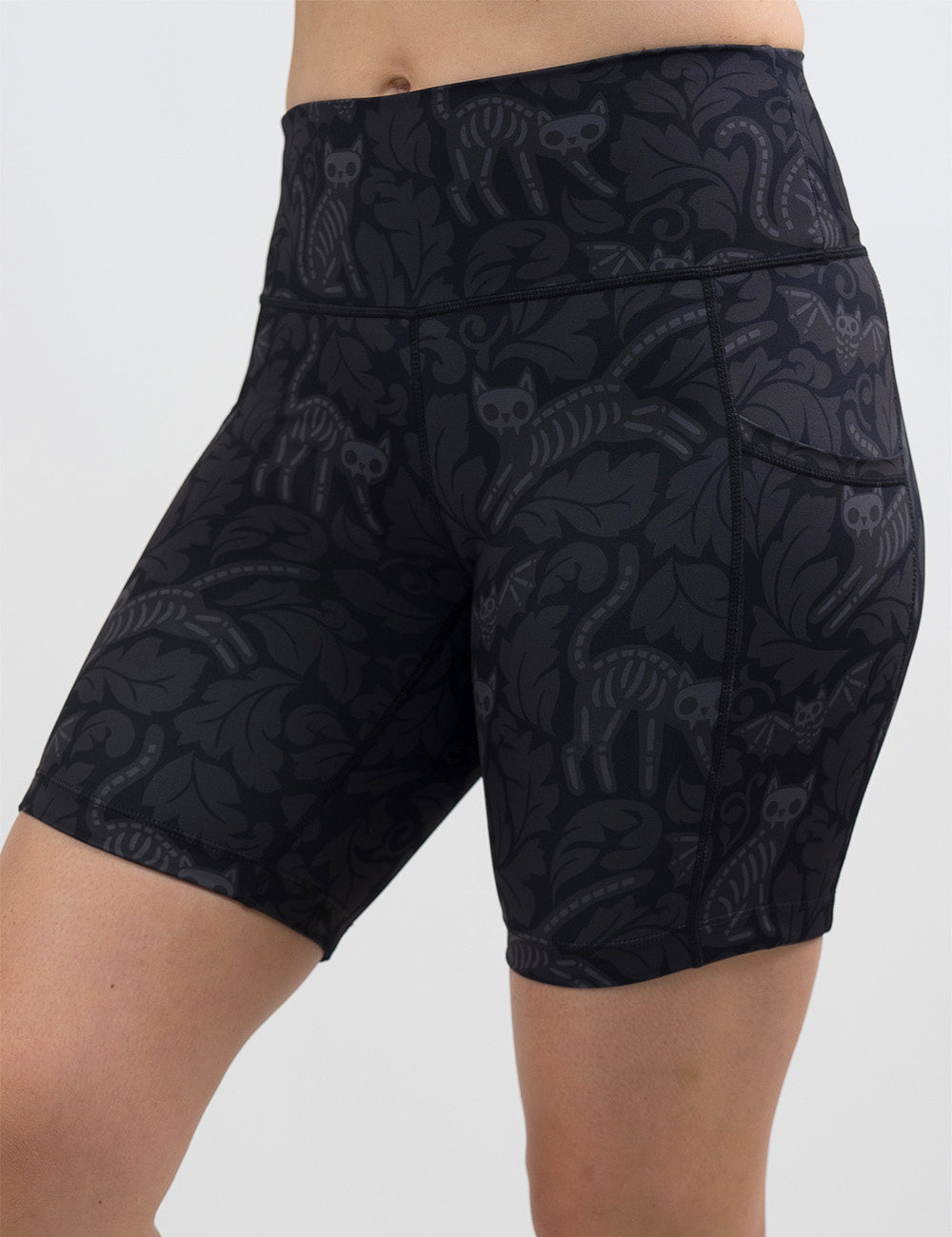 front of the 7 inch black and grey bats and cats skeleton shorts against a white background
