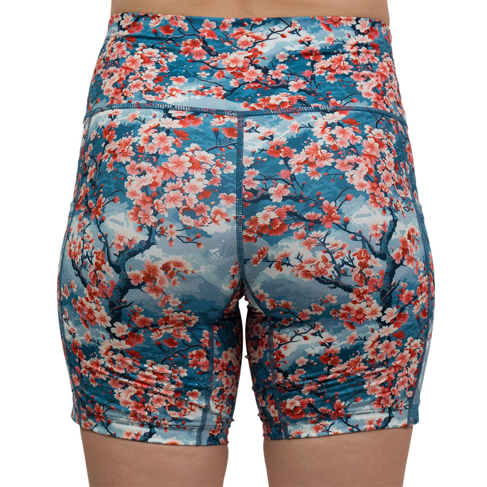 back of blooming cherry tree print 7 inch shorts against a white background
