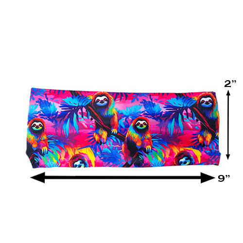colorful sloth patterned headband measured at 2 by 9 inches