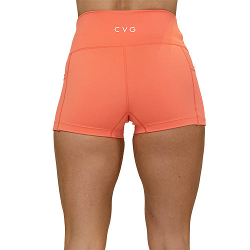 solid coral shorts back
