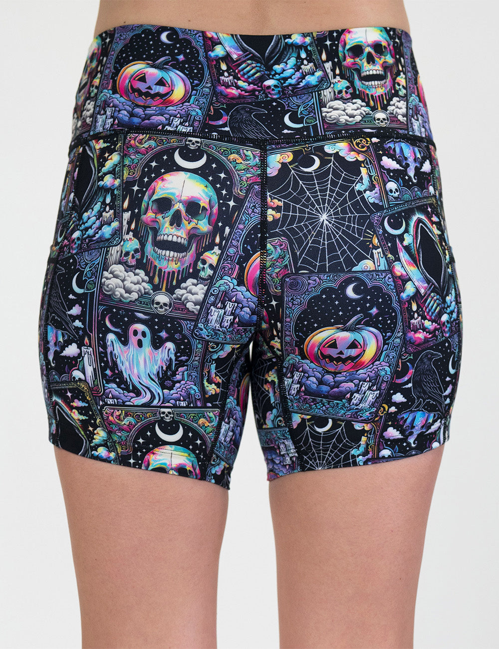 back of the 5 inch rainbow skulls, jack o lantern, and ghosts shorts against a white background