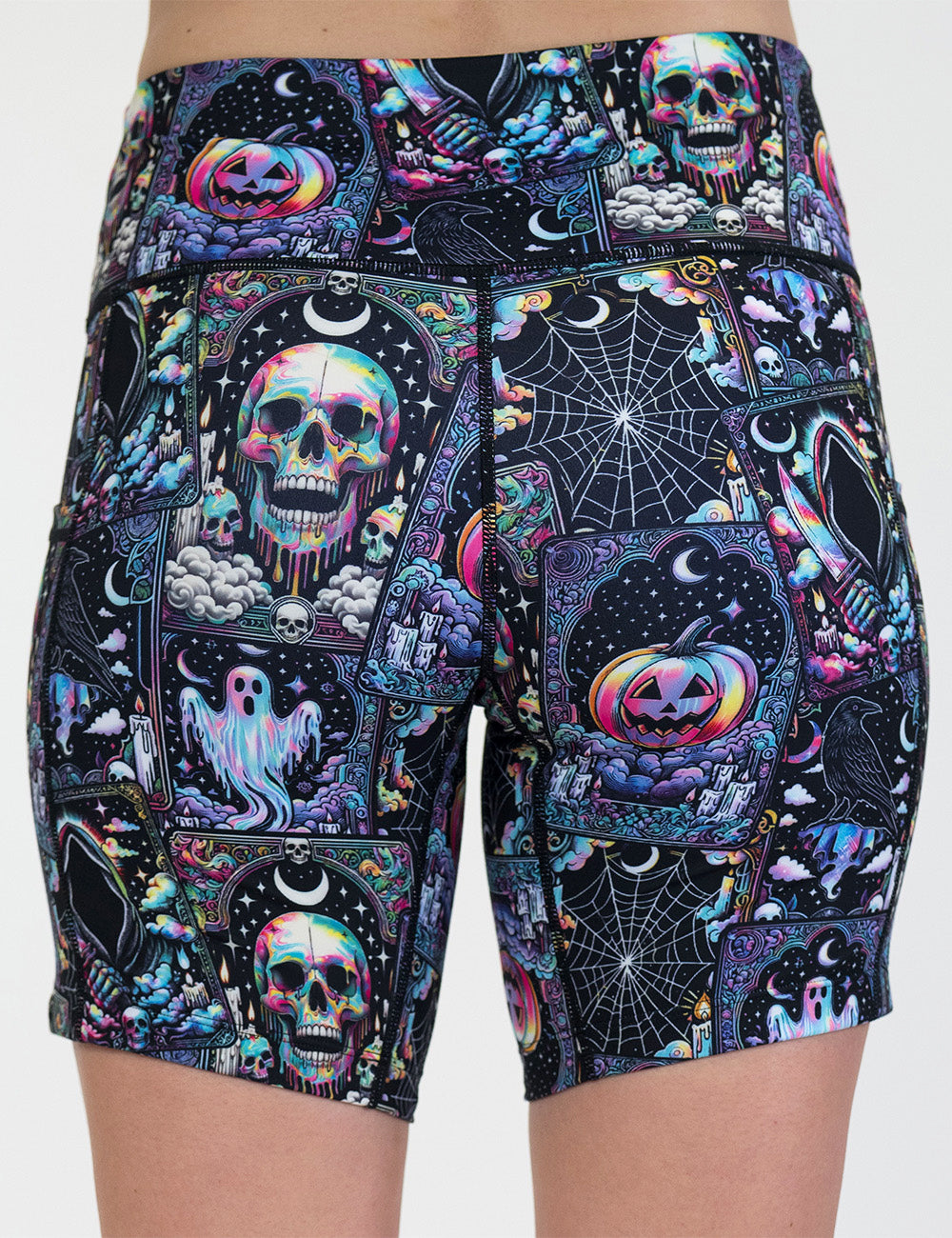 back of the rainbow skulls, jack o lantern, and ghosts 7 inch shorts against a white background