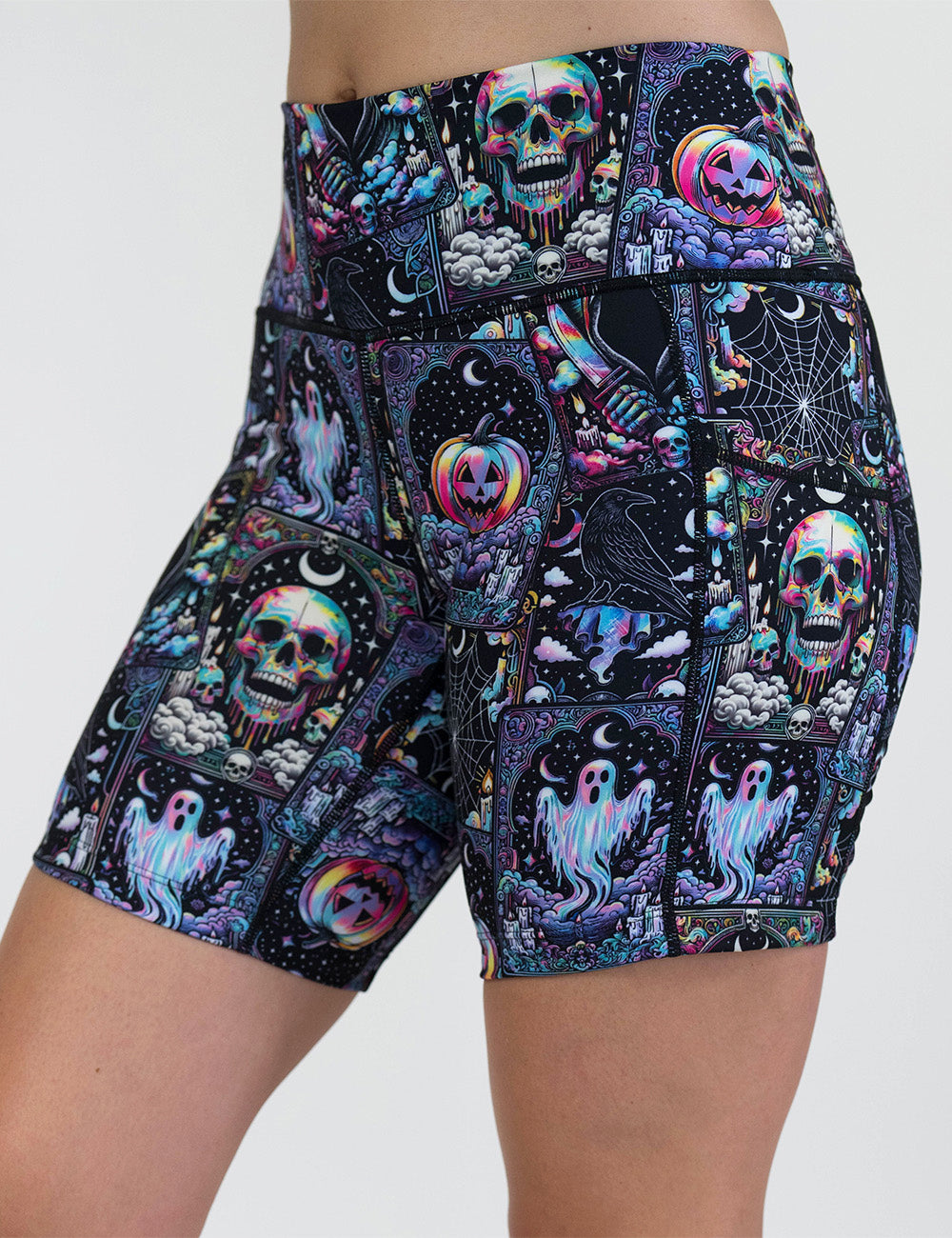 front of the rainbow skulls, jack o lantern, and ghosts 7 inch shorts against a white background