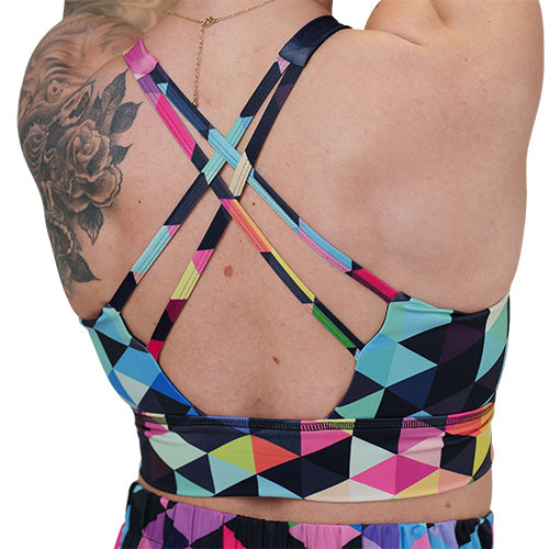 back of the rainbow color block patterned sports bra