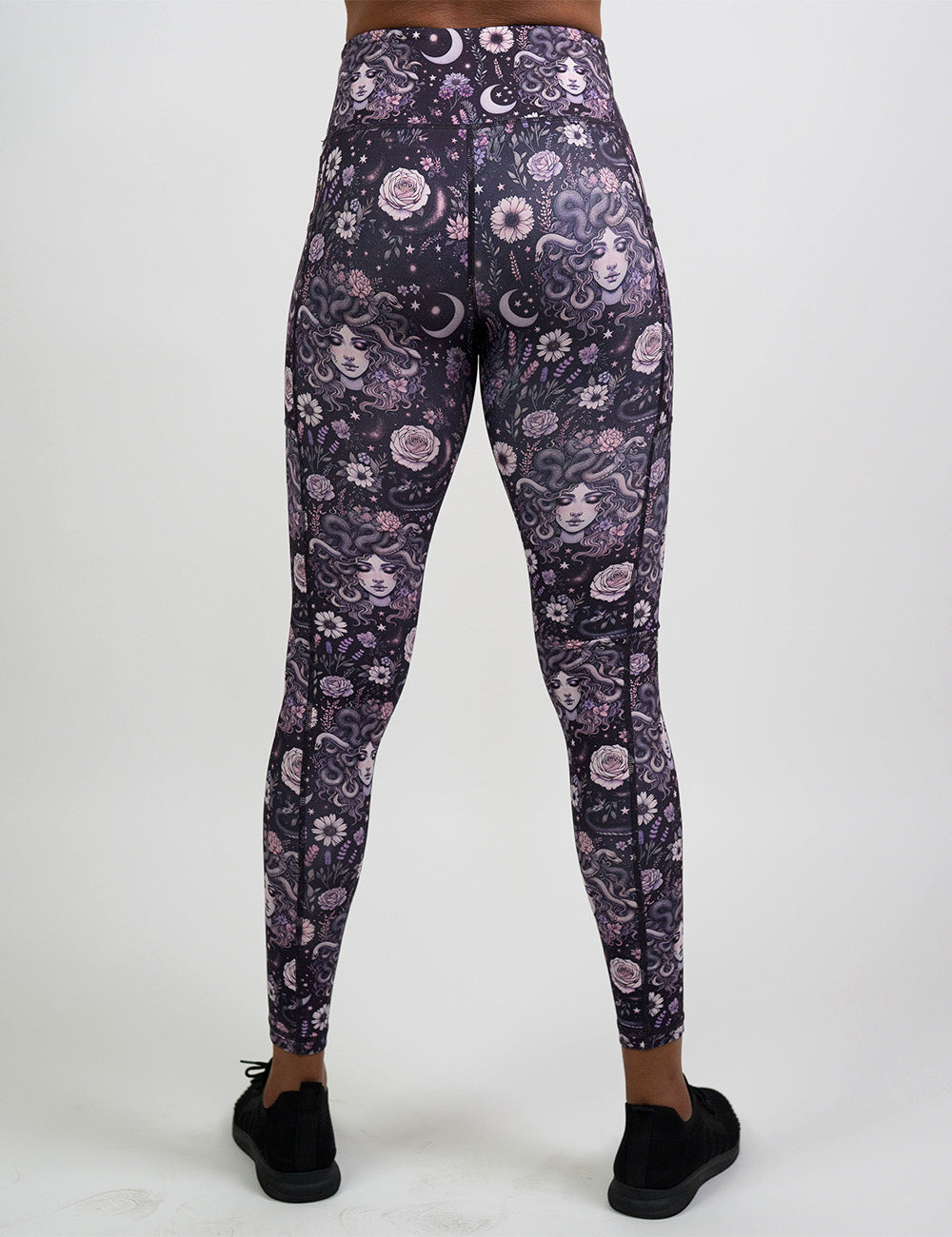 back of the purple medusa with flowers full length leggings against a white background