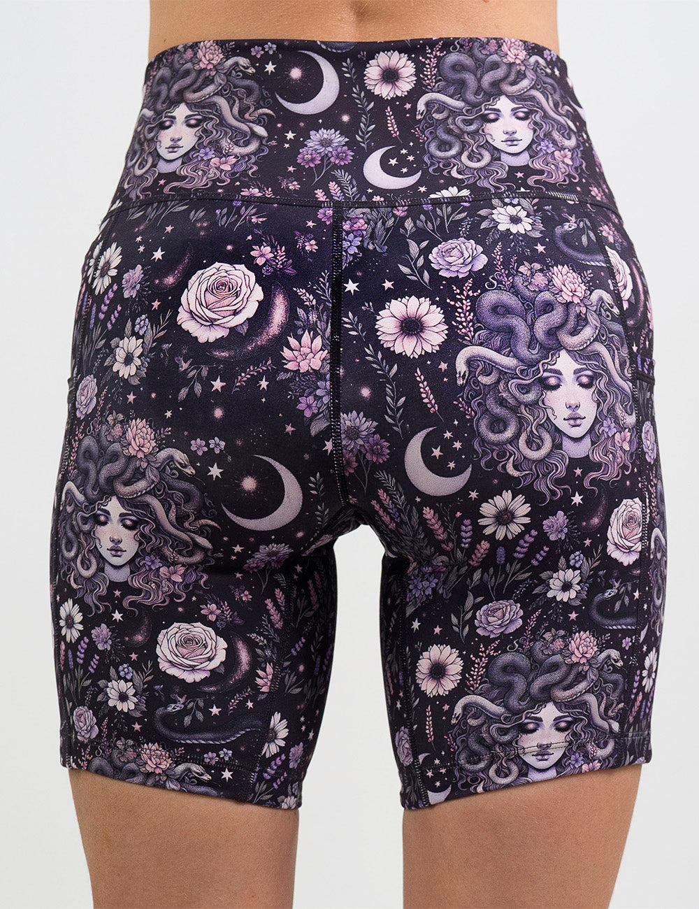 back of the 7 inch purple medusa with flowers shorts against a white background