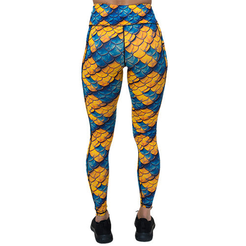 back of full length blue and yellow dragon scale print leggings