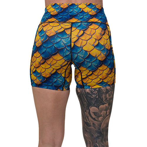back of 5 inch blue and yellow dragon scale print shorts
