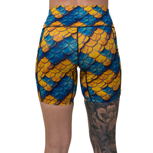back of 7 inch blue and yellow dragon scale print shorts