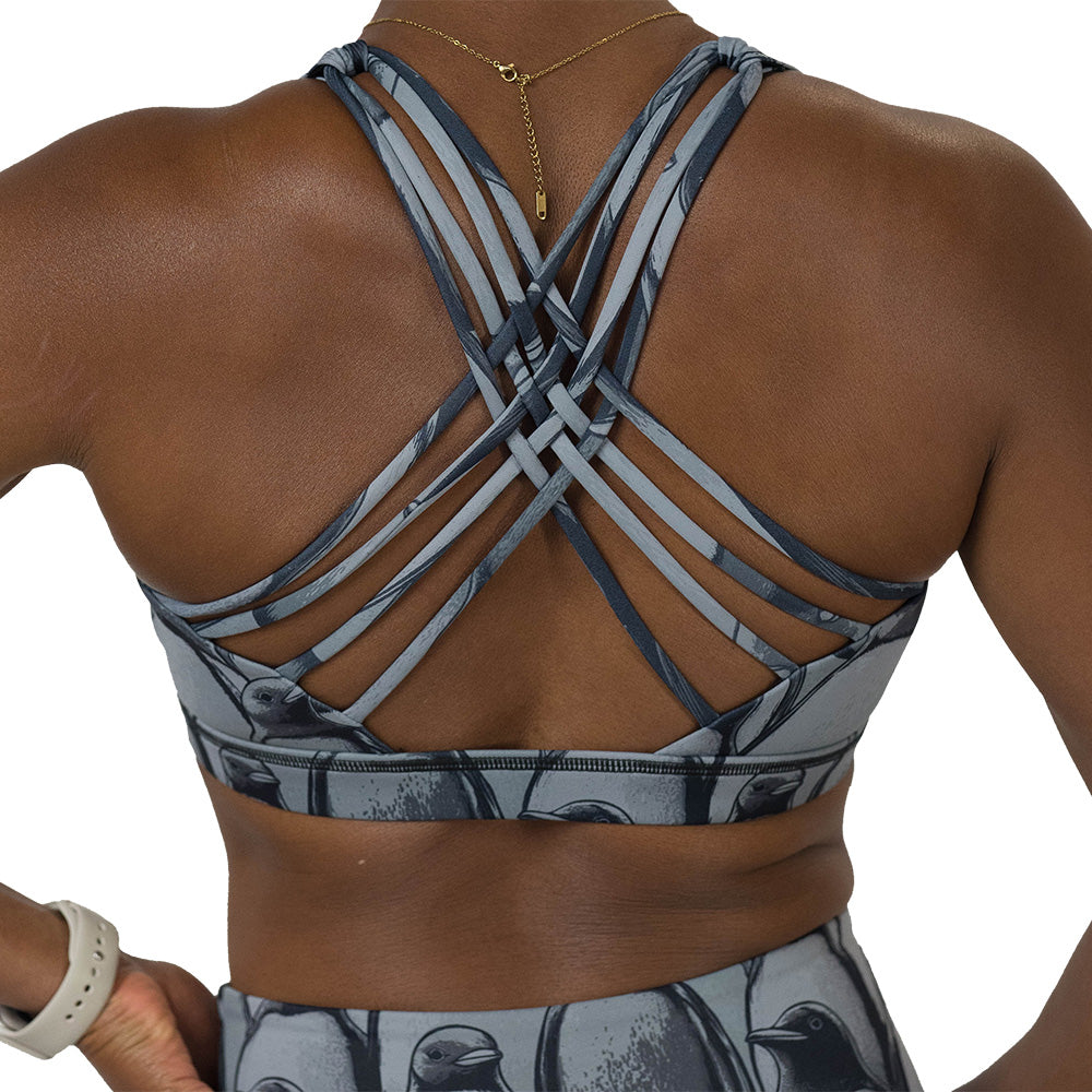 back of the penguin patterned sports bra