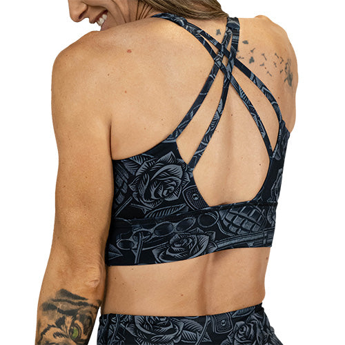 back of grey tattoo pattern sports bra