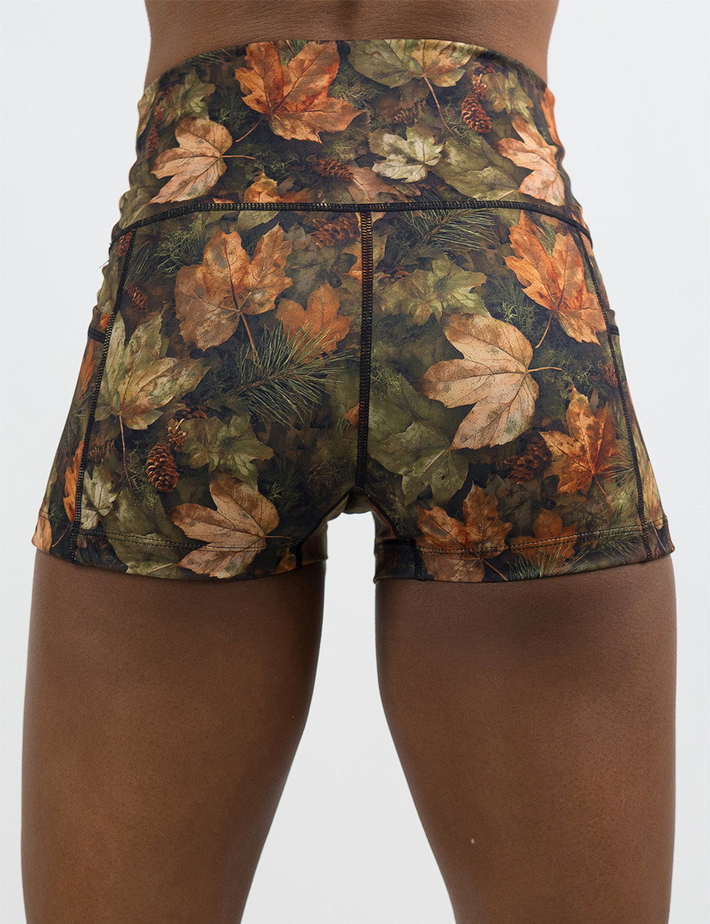 back of the 2.5 inch forest floor covered in leaves shorts against a white background