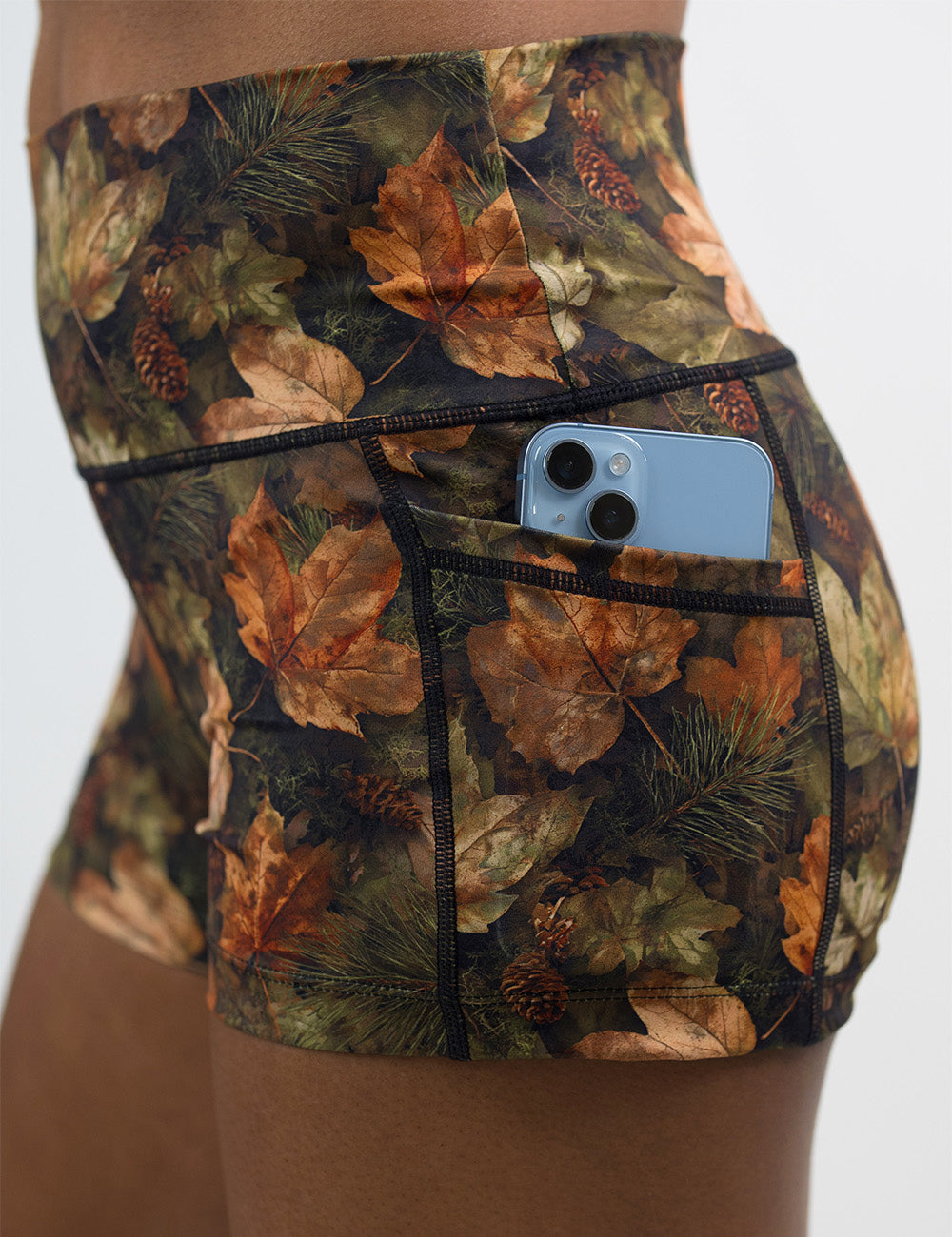 close up of the 2.5 inch forest floor covered in leaves shorts against a white background