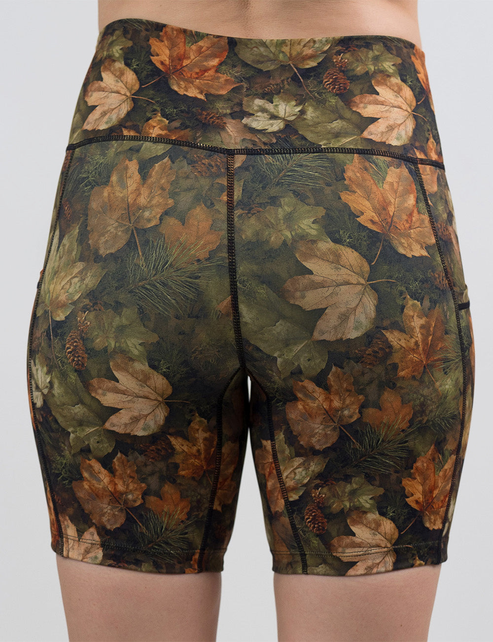 back of the 7 inch forest floor covered in leaves shorts against a white background