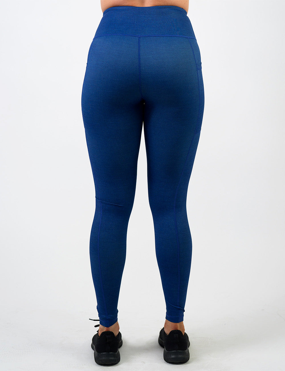 back of the blue denim inspired pattern full length leggings against a white background
