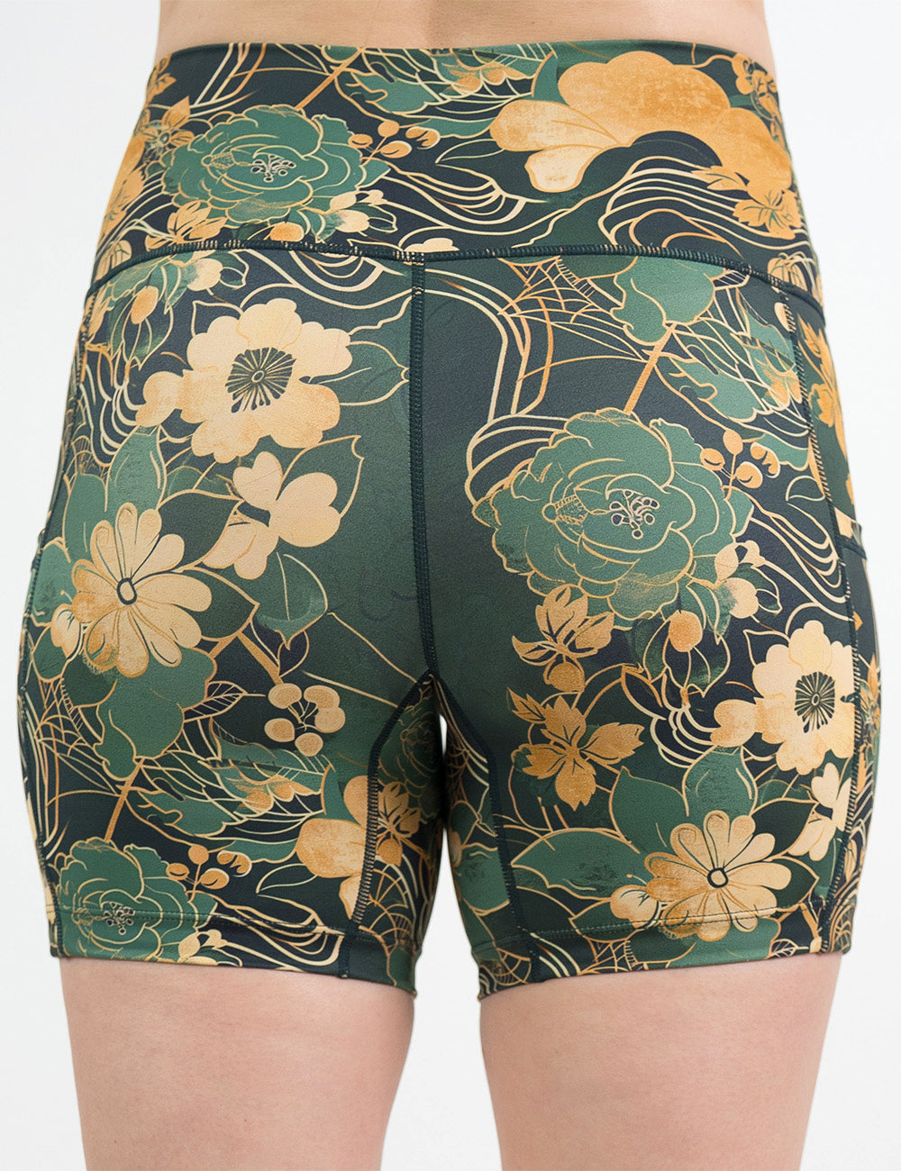 back of the 5 inch green and gold flower with gold accent shorts