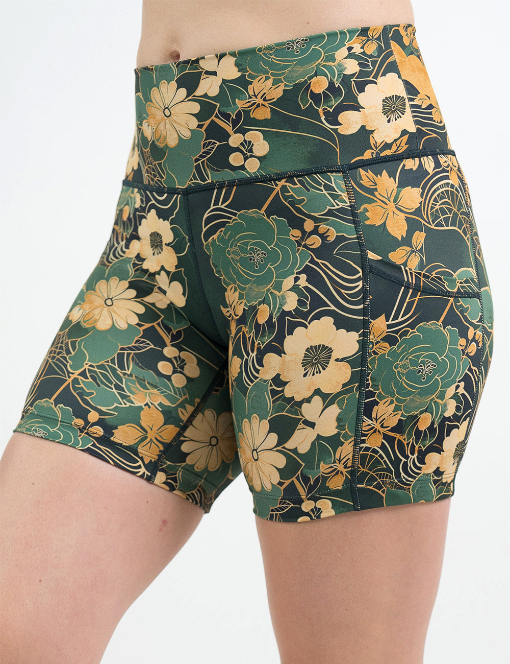 front of the 5 inch green and gold flower with gold accent shorts