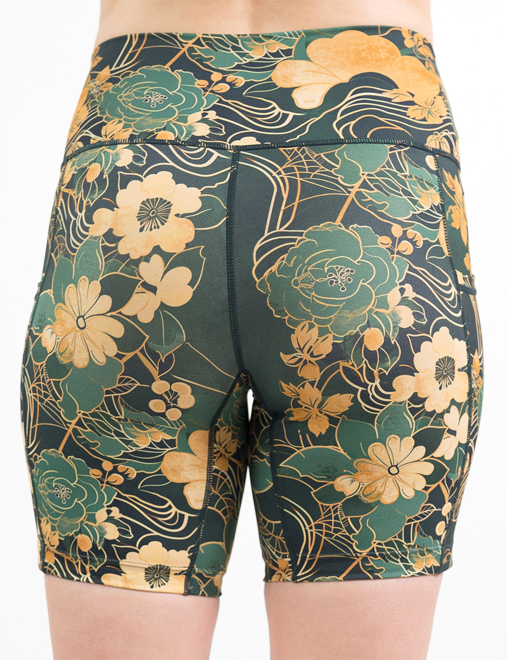back of the 7 inch green and gold flower with gold accent shorts