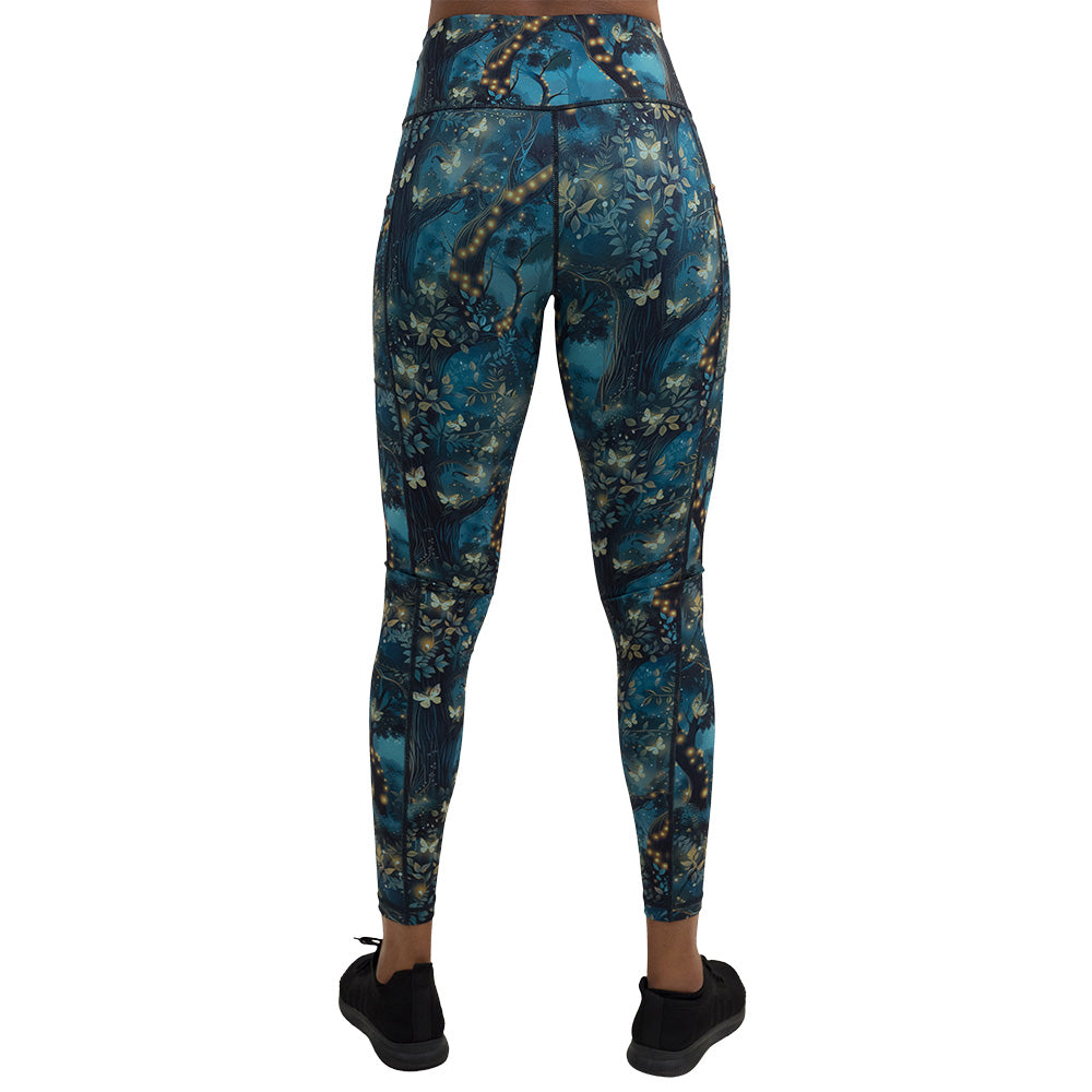 back of the forest filled with firefly's pattern full length leggings against a white background