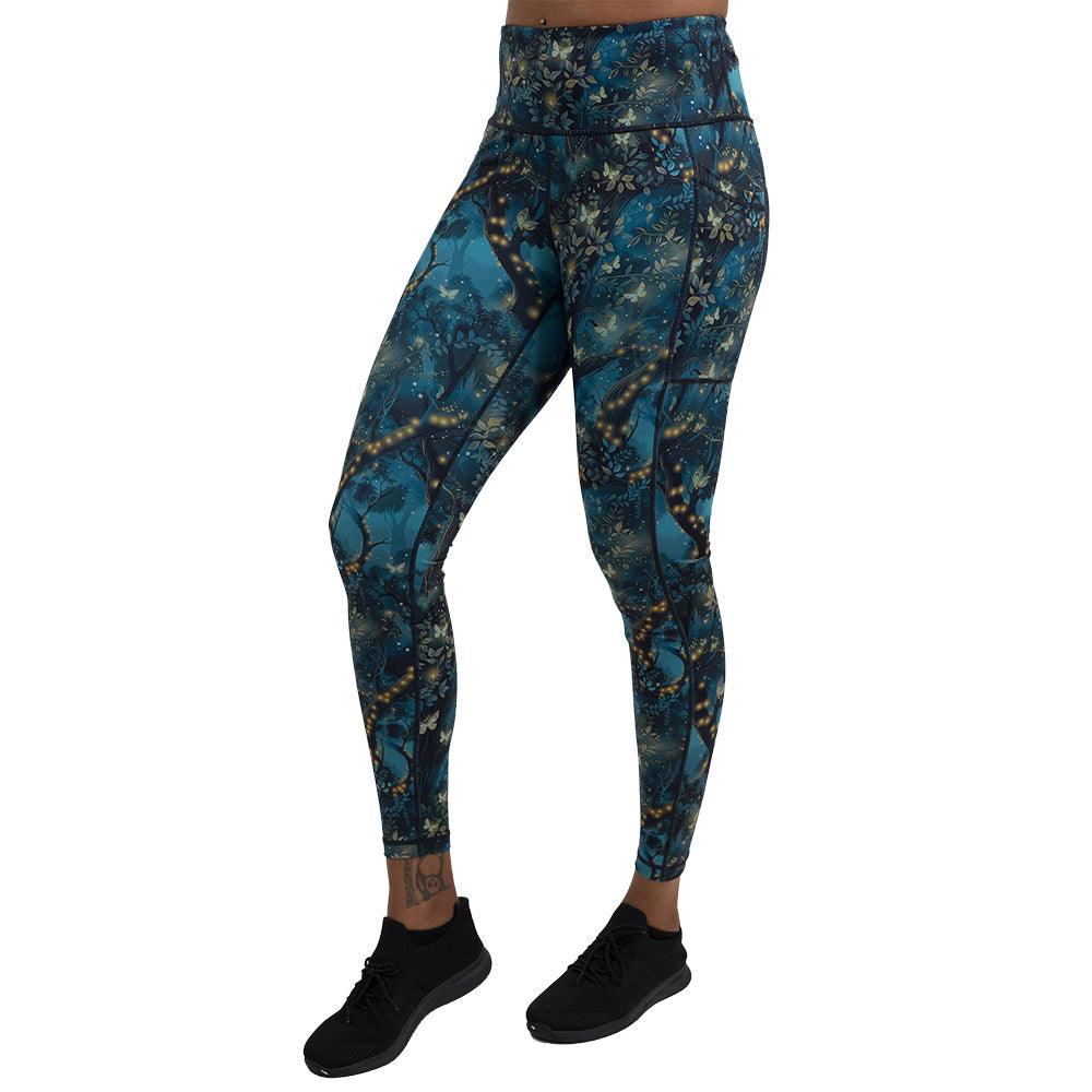 forest filled with firefly's pattern full length leggings facing the front against a white background
