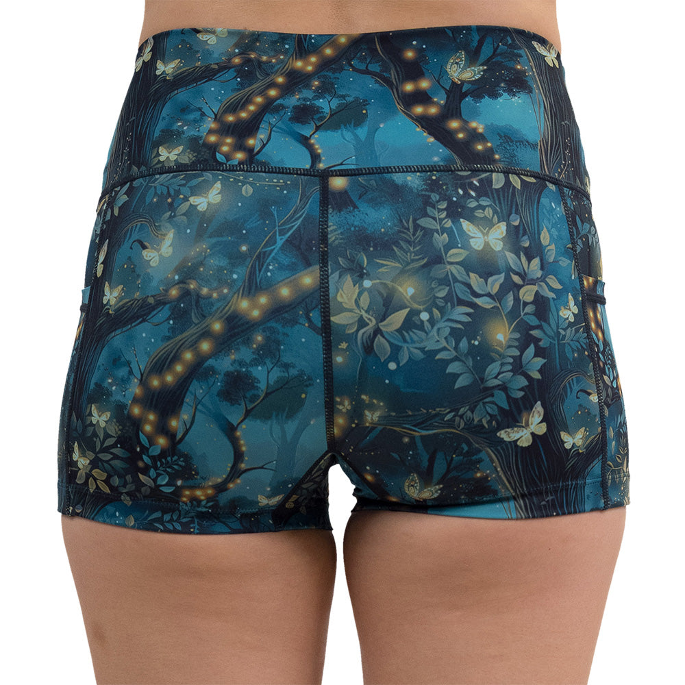 back of the forest filled with firefly's pattern 2.5 inch shorts against a white background