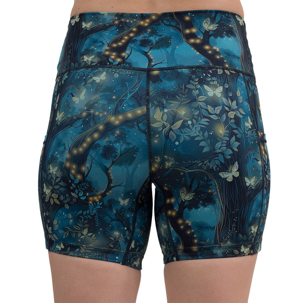 back of the forest filled with firefly's pattern 5 inch shorts against a white background