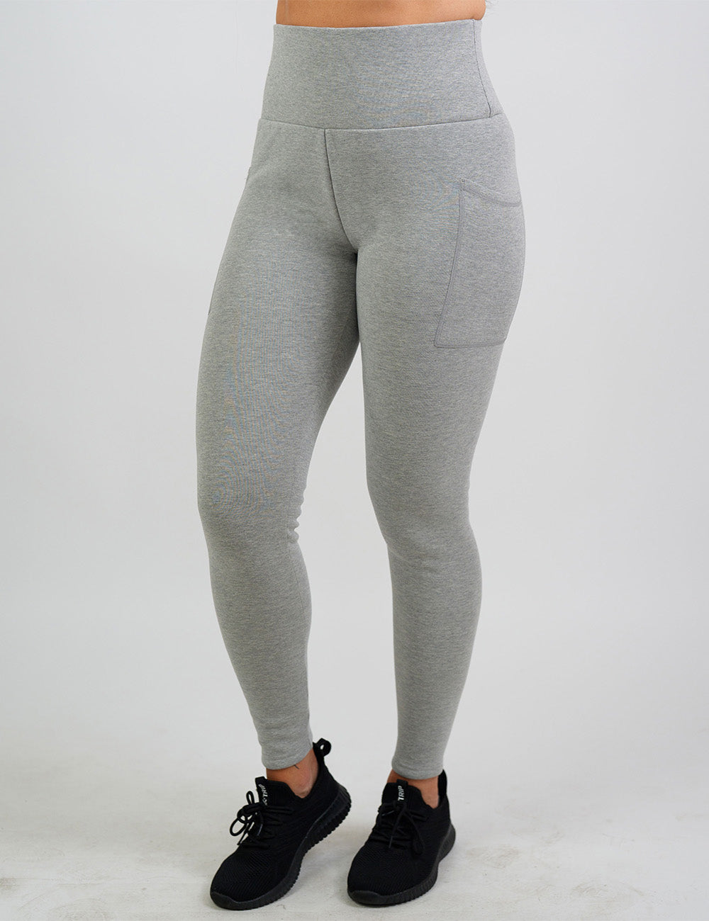 front of the solid grey fleece lined leggings against a white background