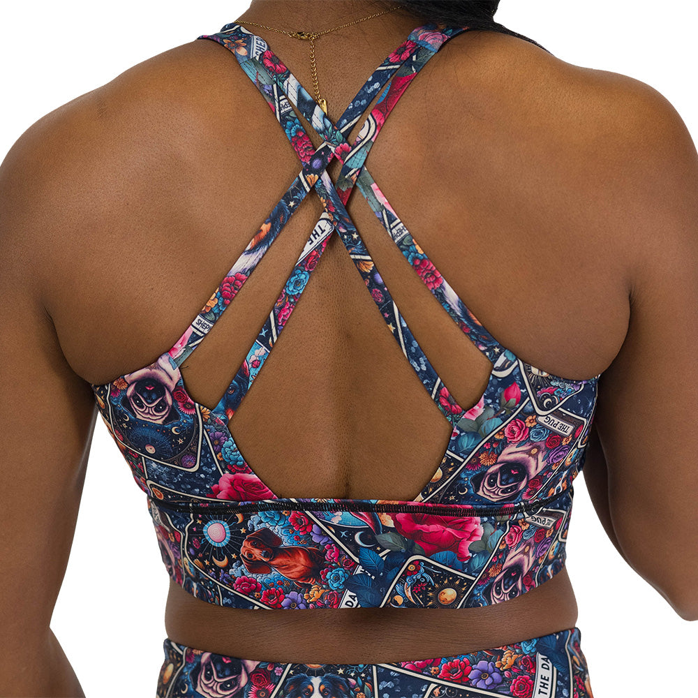 back of the Colorful sports bra with dog illustration pattern on it