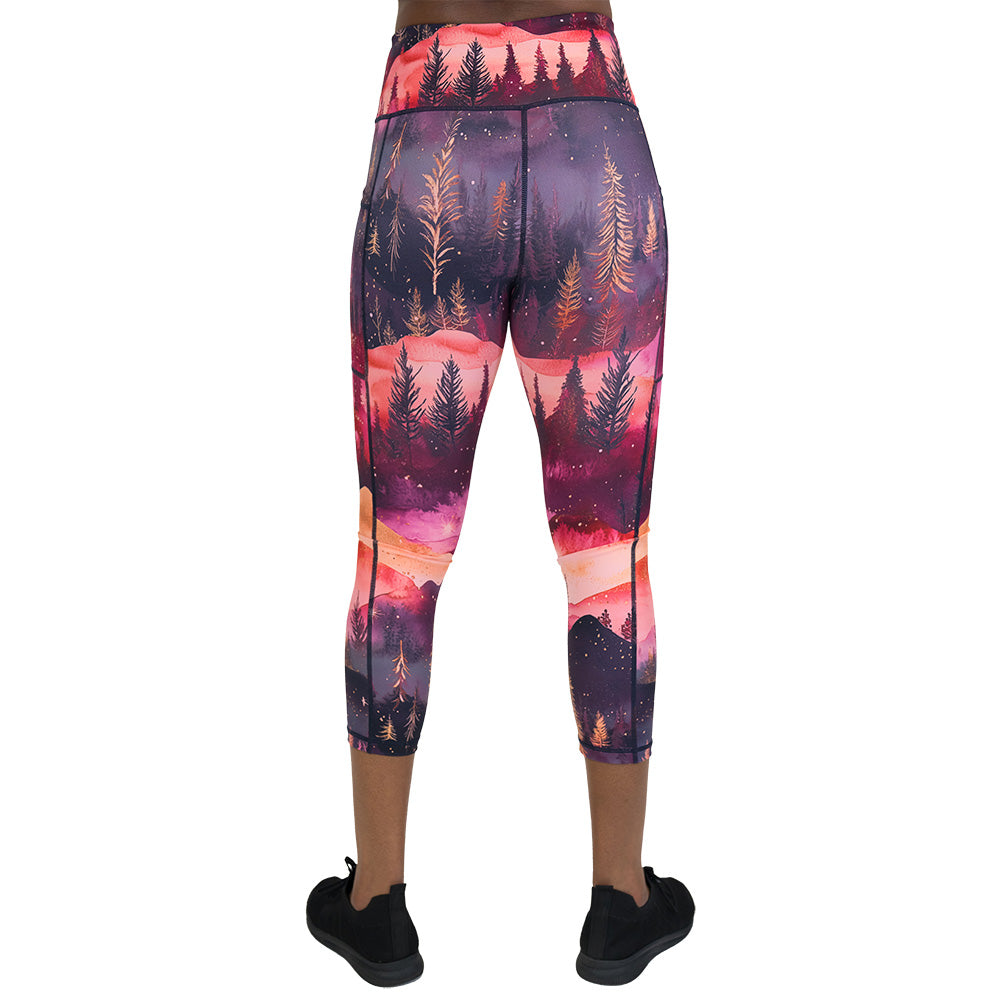 back of the leggings with forest design and red ombre sky