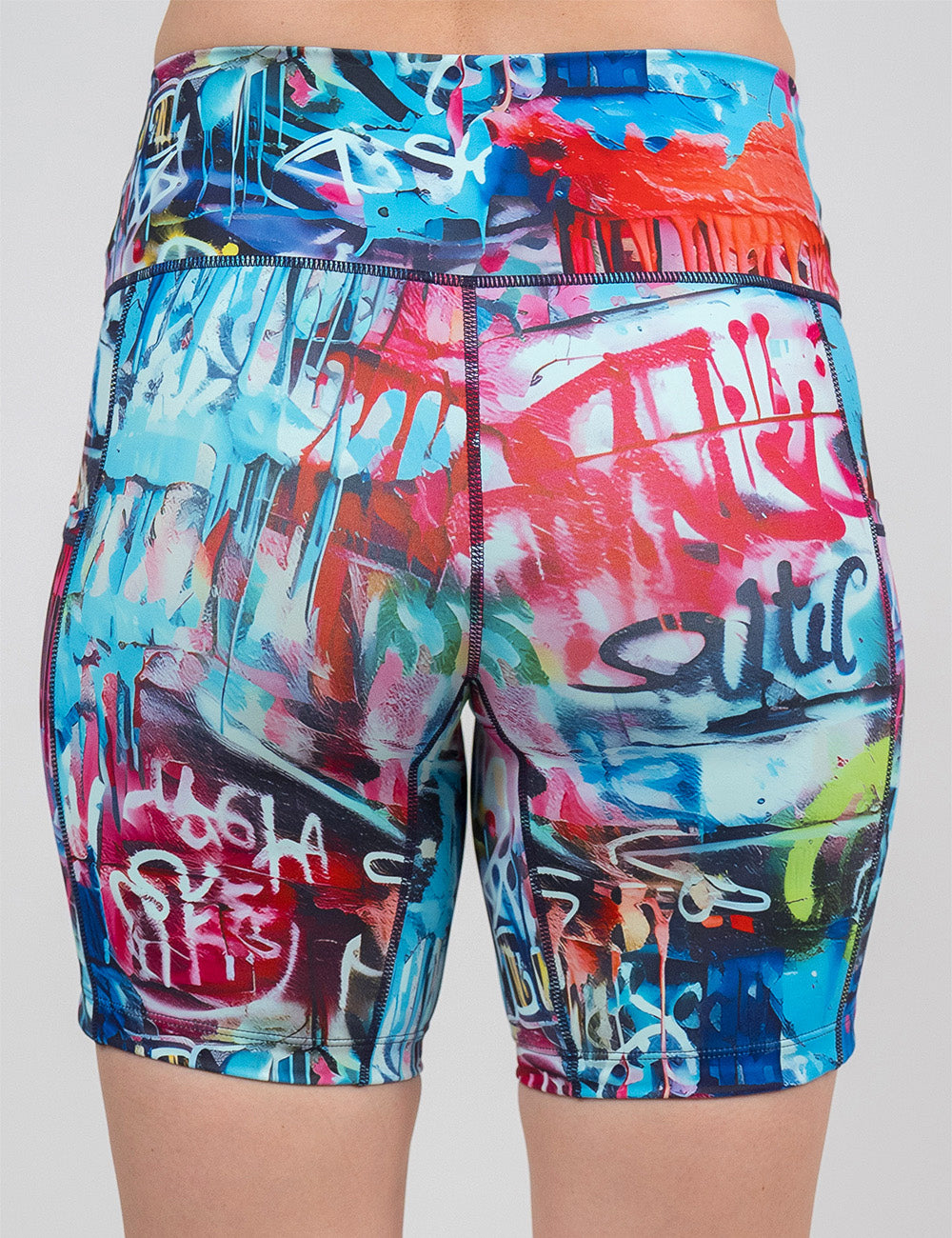back of the 7 inch multi colored graffiti pattern shorts against a white background