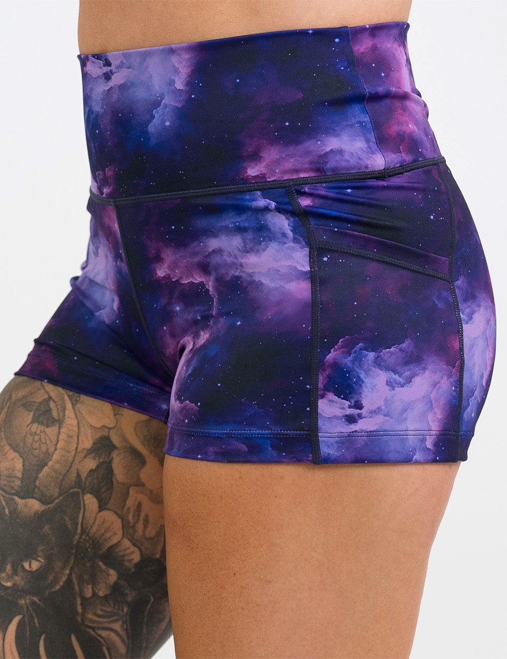 front of the purple space patterned 2.5 inch shorts against a white background