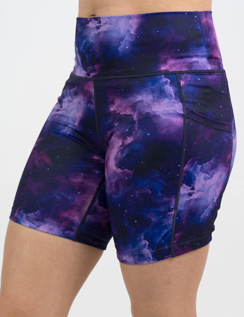 front of the 7 inch purple space patterned shorts against a white background