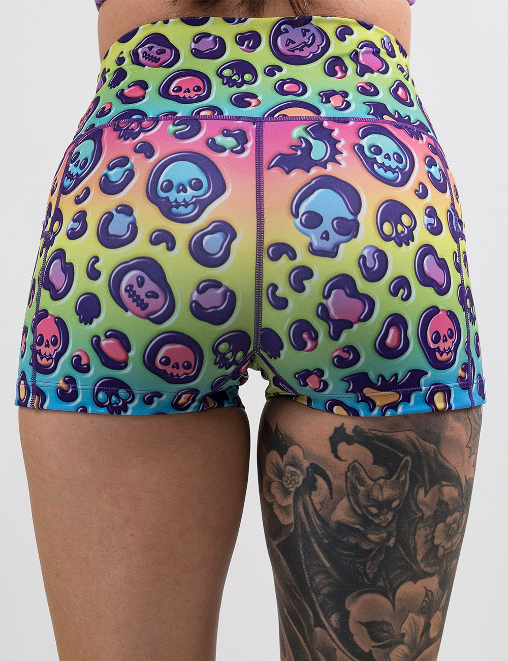 back of the rainbow leopard print pumpkins and skulls 2.5 inch shorts against a white background