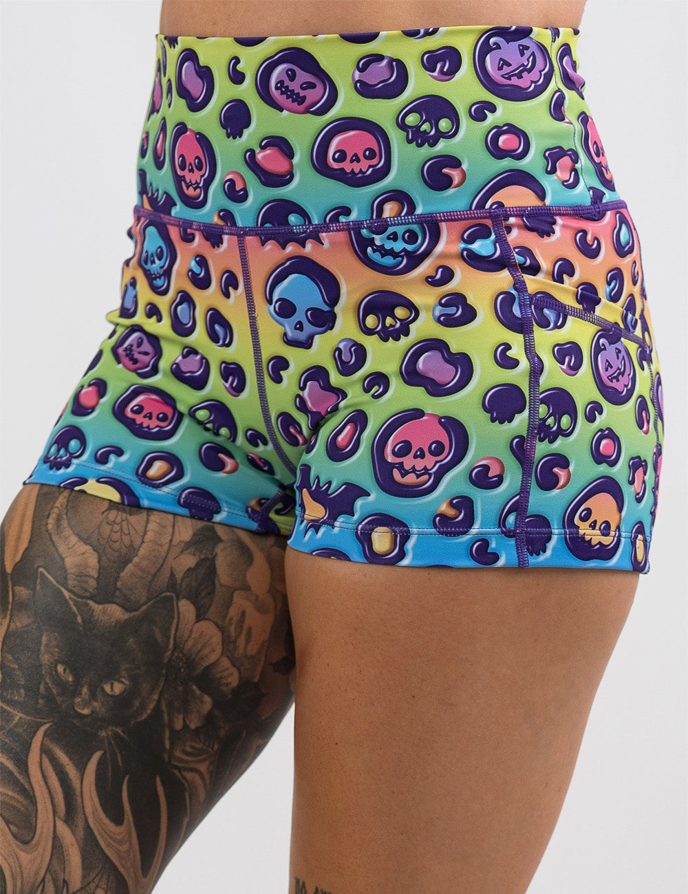 front of the rainbow leopard print pumpkins and skulls 2.5 inch shorts against a white background