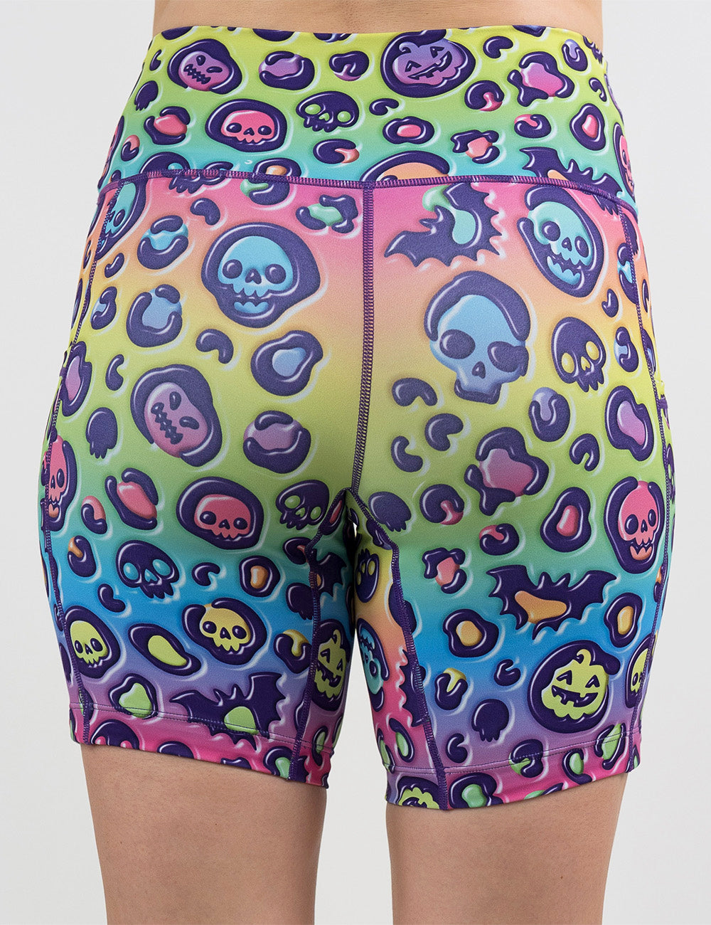back of the rainbow leopard print pumpkins and skulls 5 inch shorts against a white background