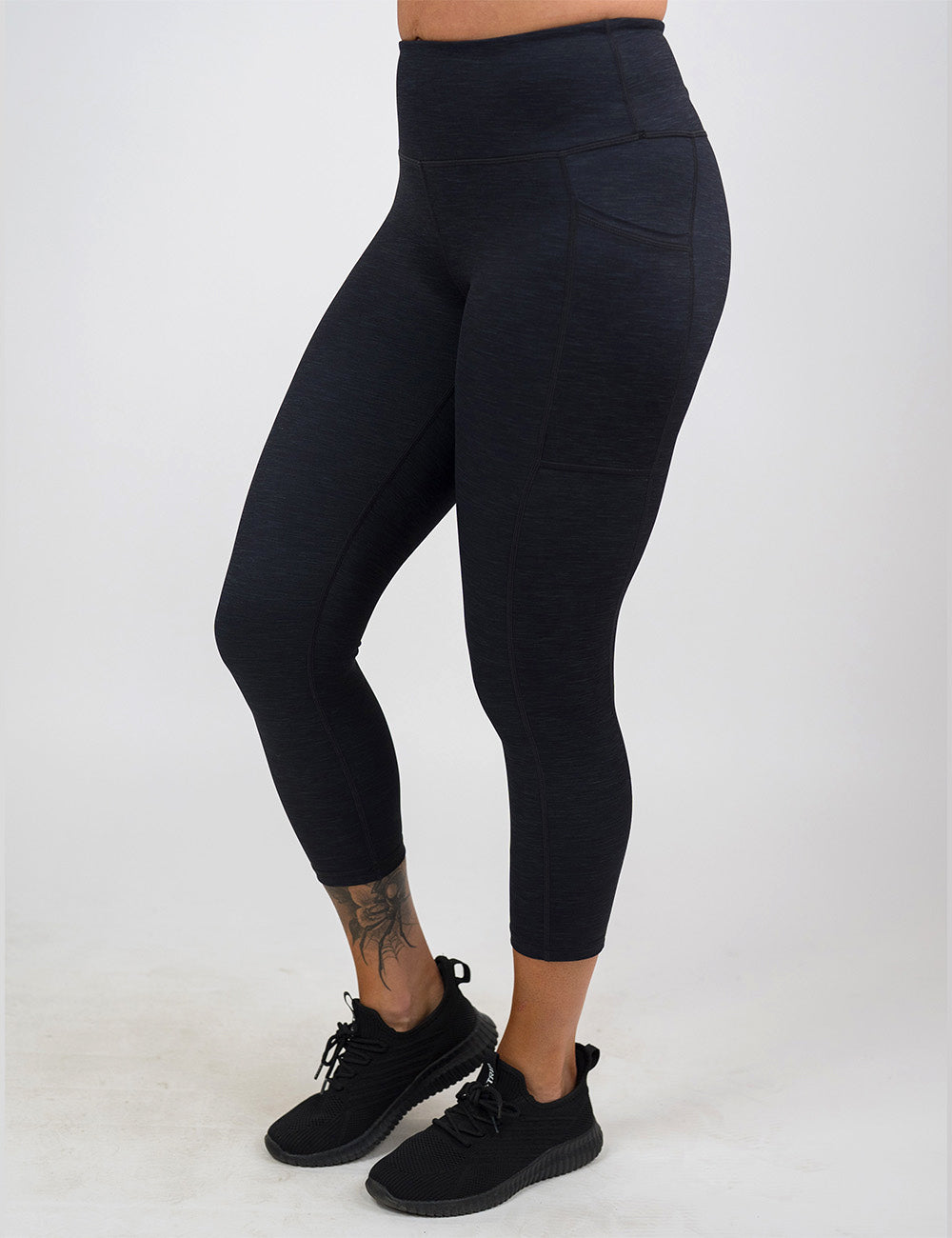 front of the capri black heather pattern leggings against a white background