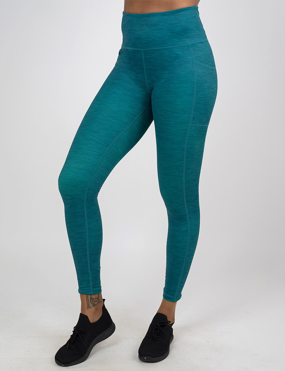 front of the full length teal heather pattern leggings against a white background