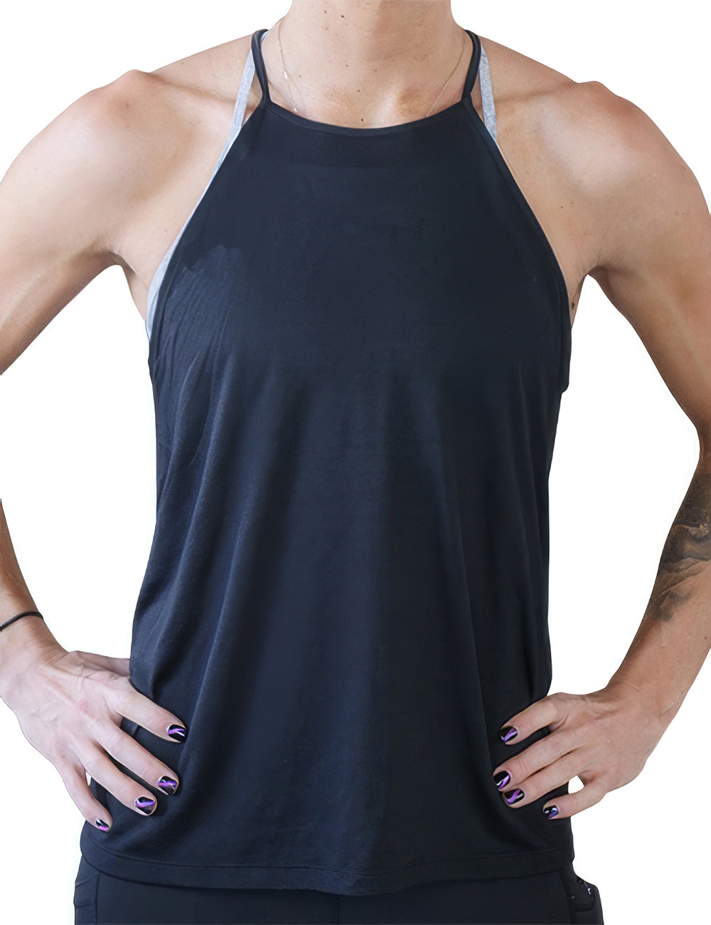 front of the model wearing a black high neck flowy tank top against a white background