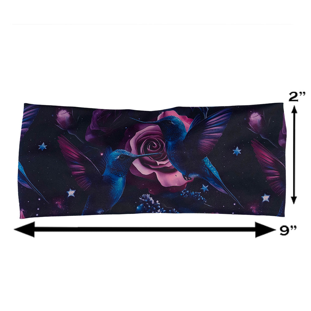headband with a design of a blue hummingbird and pink roses measured at 2 by 9 inches