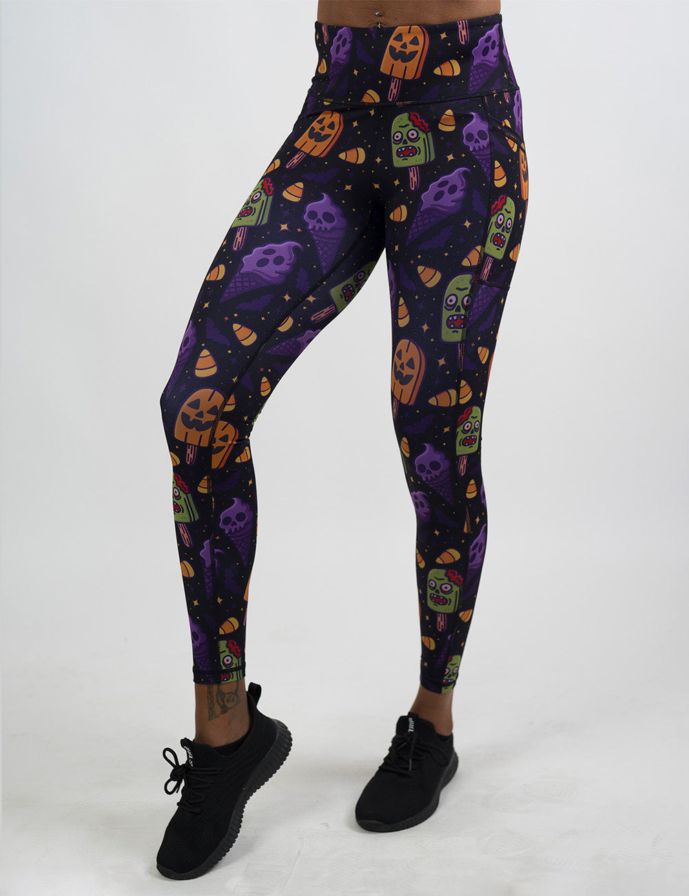 front of the zombie, jack o lantern, and ghost ice cream's full length leggings against a white background