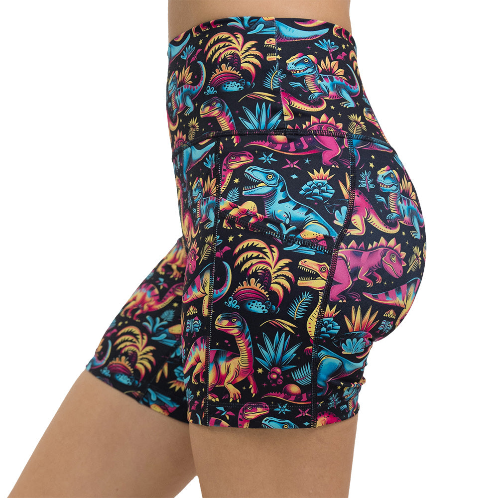 dinosaur print 5 inch shorts facing the side against a white background