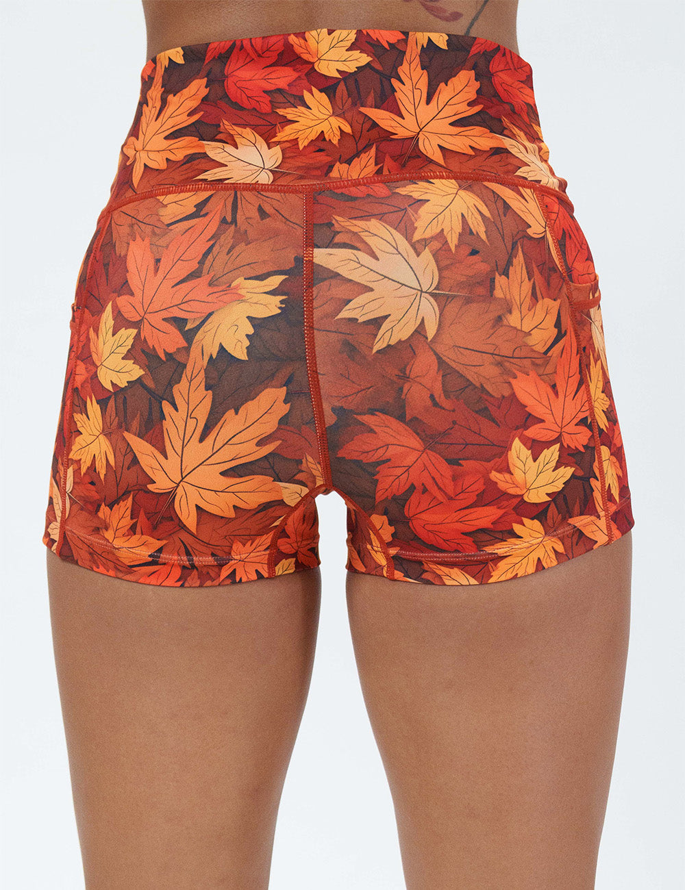 back of the 2.5 inch orange leaves shorts against a white background