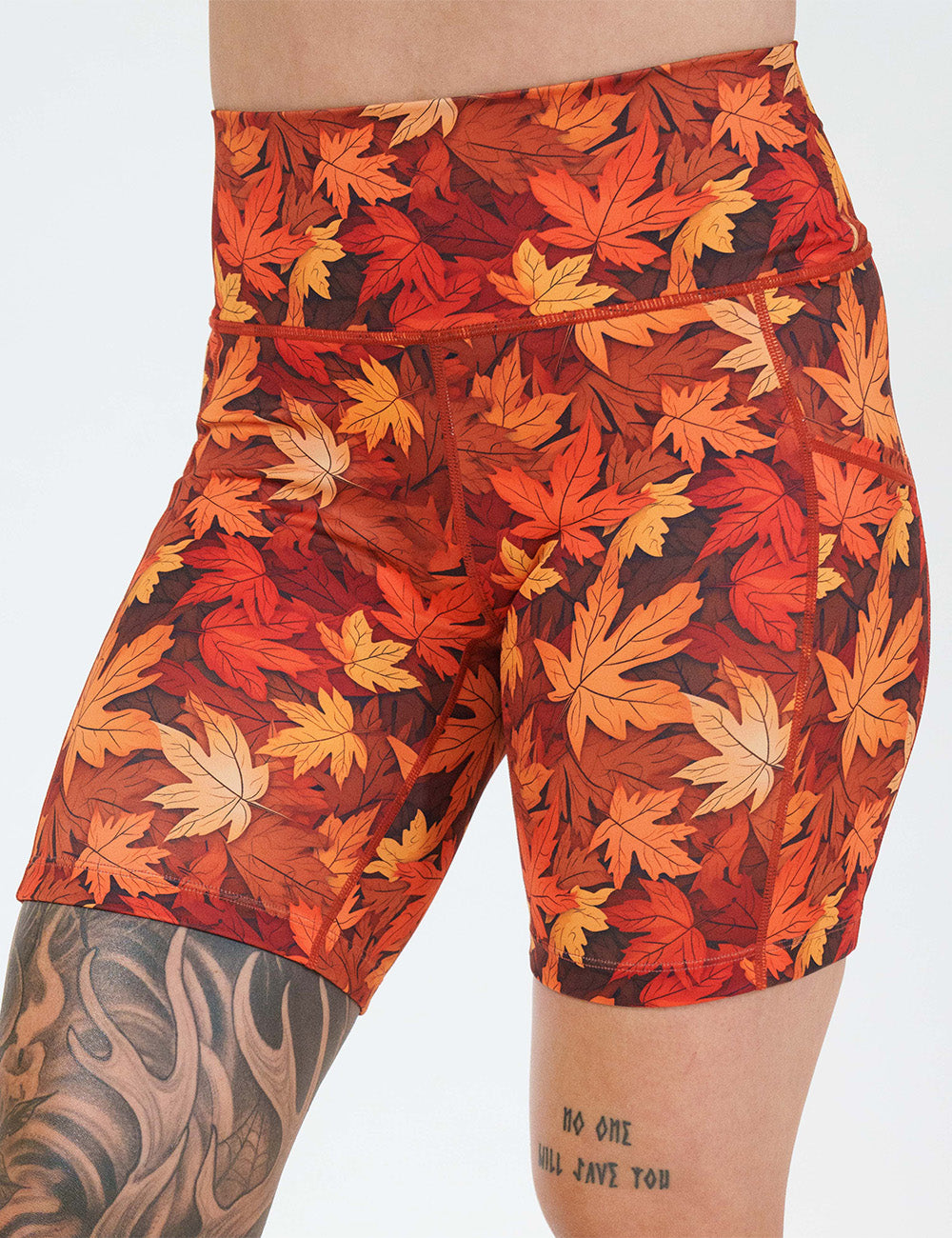 front of the 7 inch orange leaves shorts against a white background