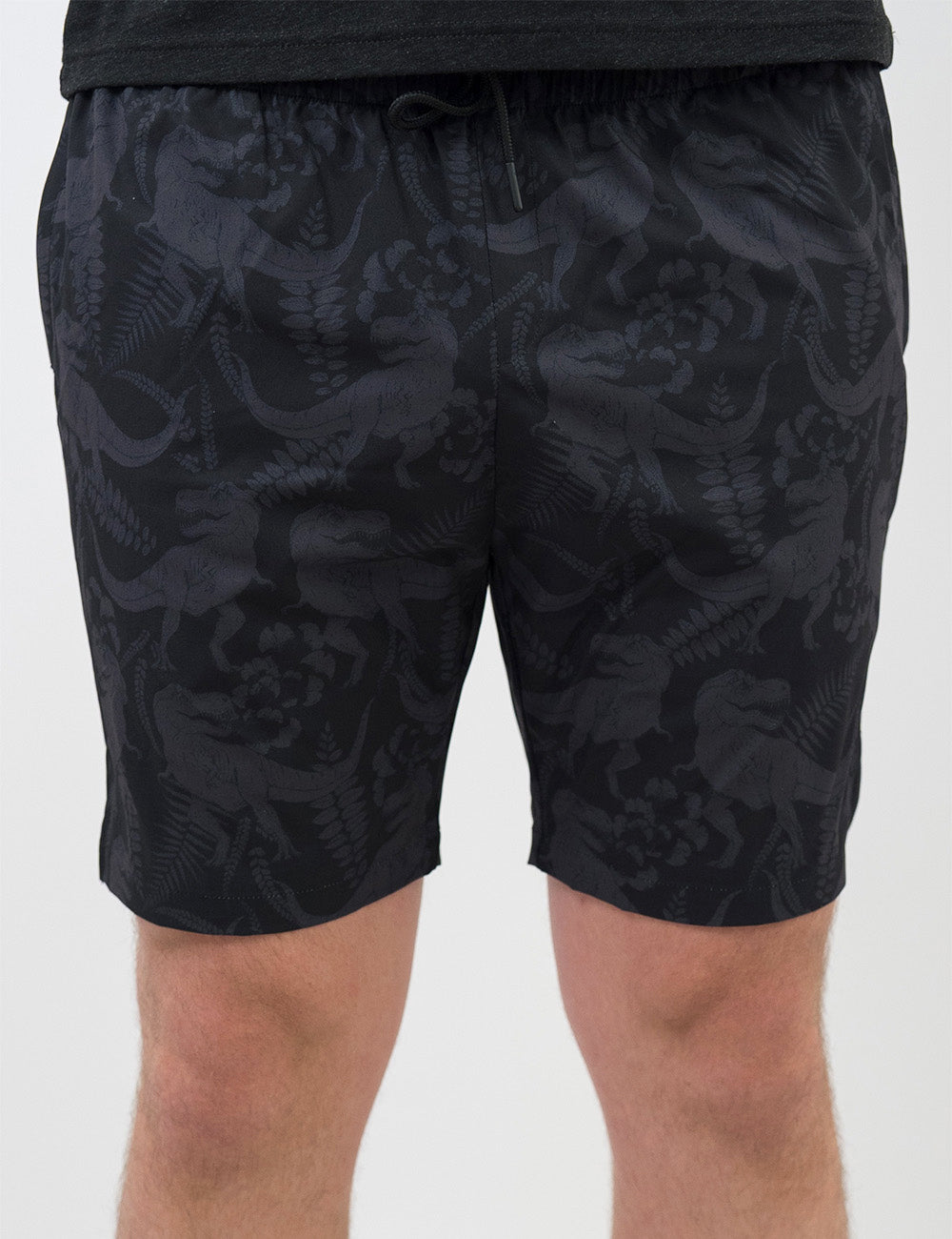 front of the black men's shorts with a tonal grey t-rex pattern against a white background